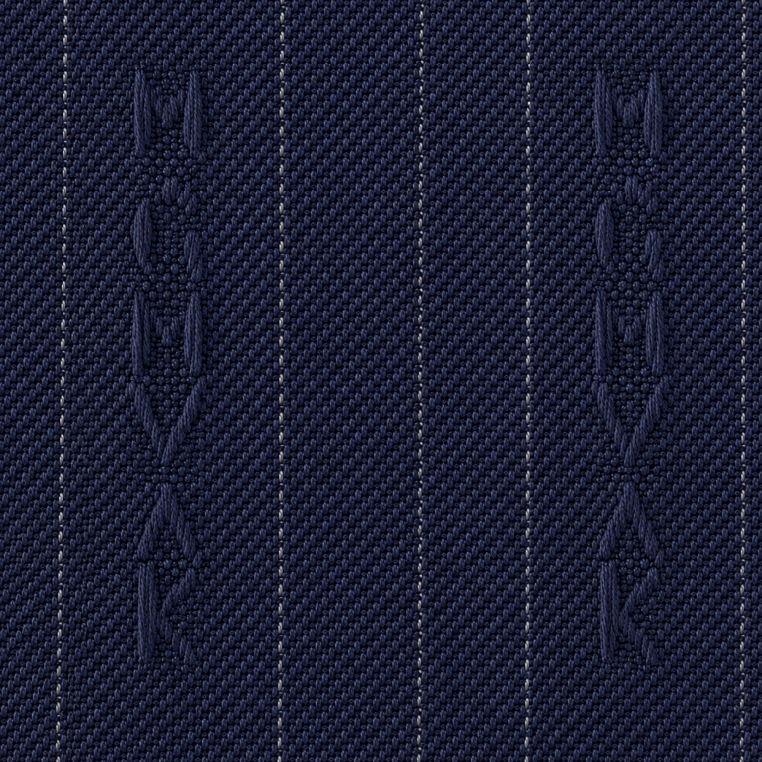 Detailed woven identity motif in Neilane navy fabric
